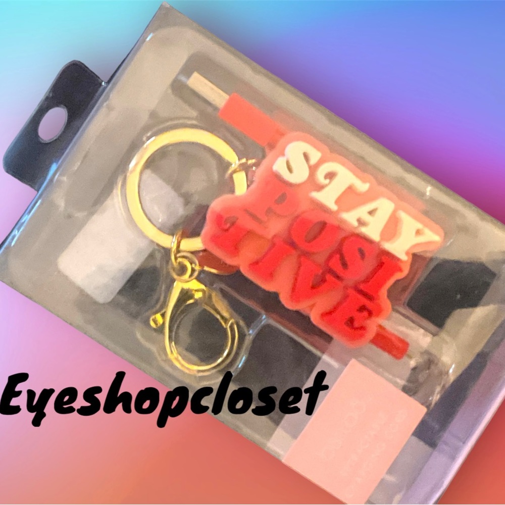 Bando Retrackable charger with gold clip to attach to keys or bag '